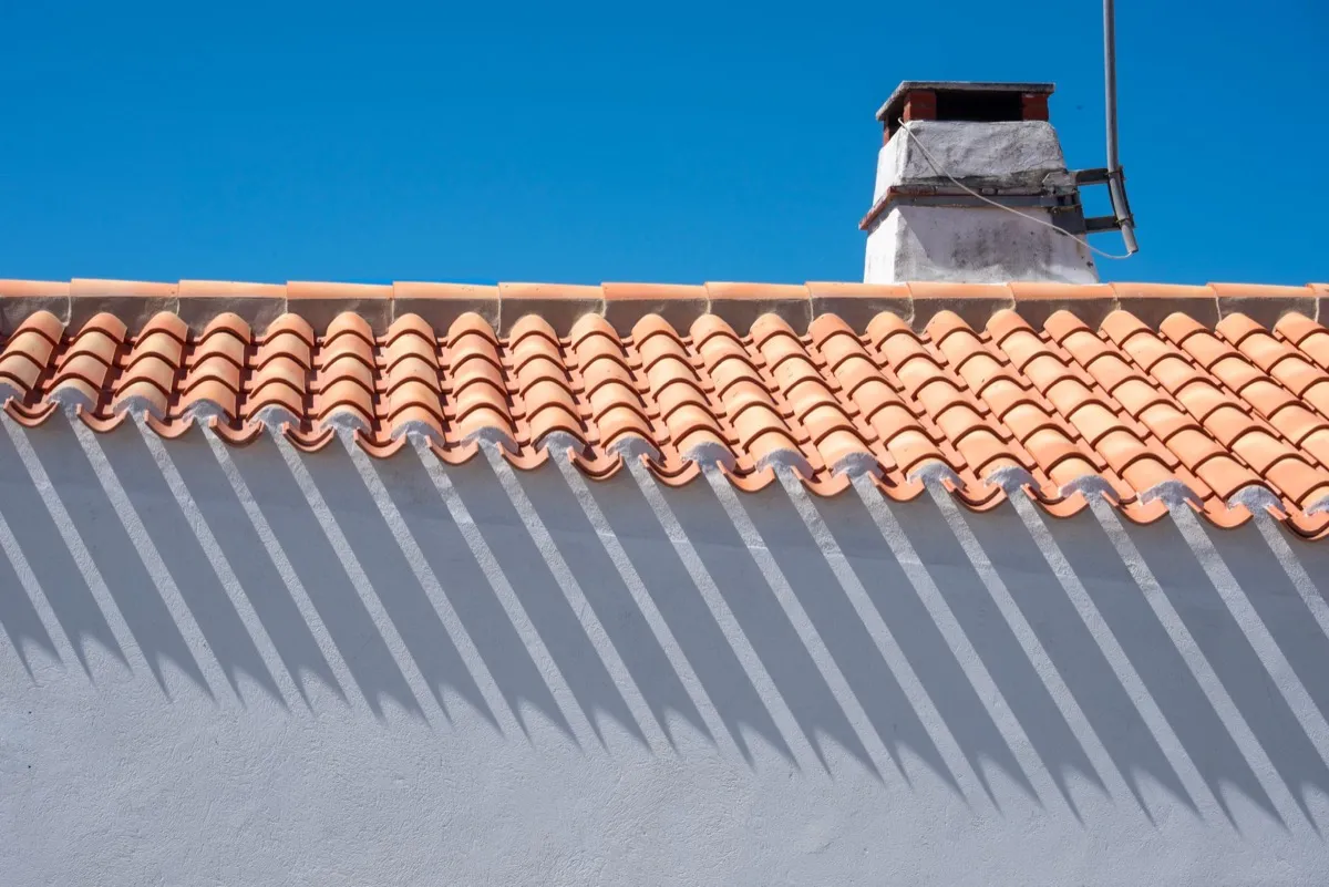 Roof ridge line and chimney on a home in Missoula, MT