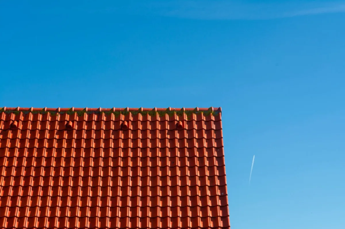 Tile roof gable in full sun, the kind of exposure that sets roof life in Missoula, MT