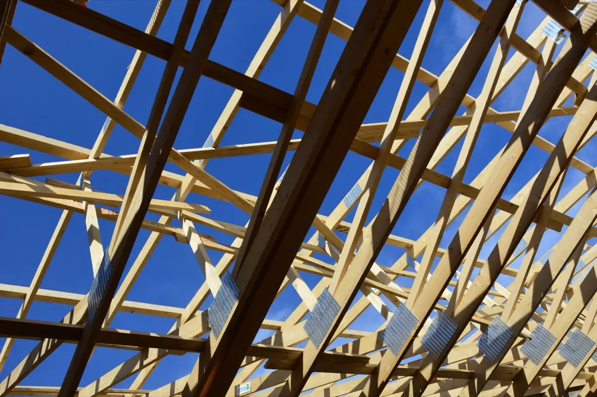 Bare rafters and panel decking on a house in Missoula, MT before the covering goes back on